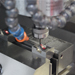 Close-up of a high-speed CNC machine in action