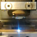Close-up of one of our wire EDM machines in action